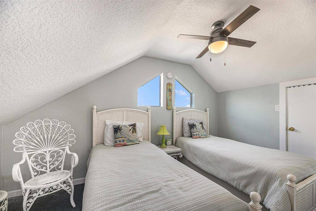 Loft area above secondary bedrooms currently set up for AirBnB style rental