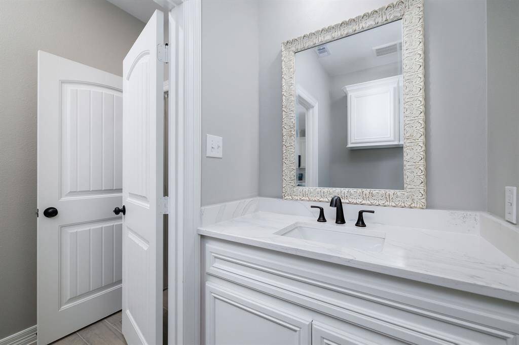 Half bath off the laundry, kitchen and Family room