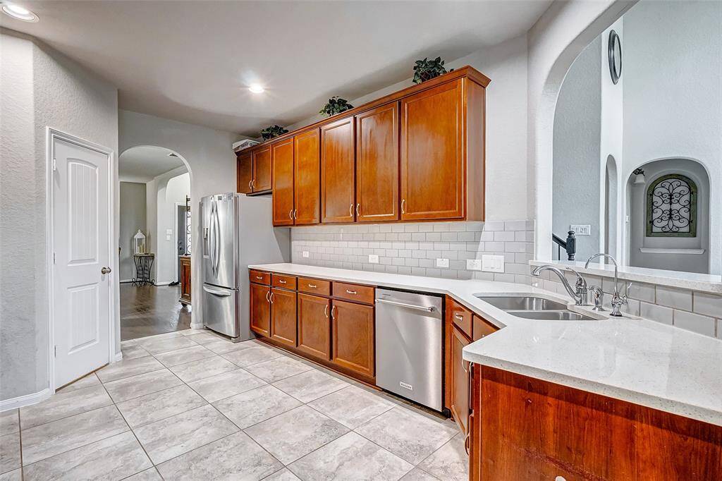 The layout is spacious and features beautiful cork countertops that add a touch of warmth and elegance.