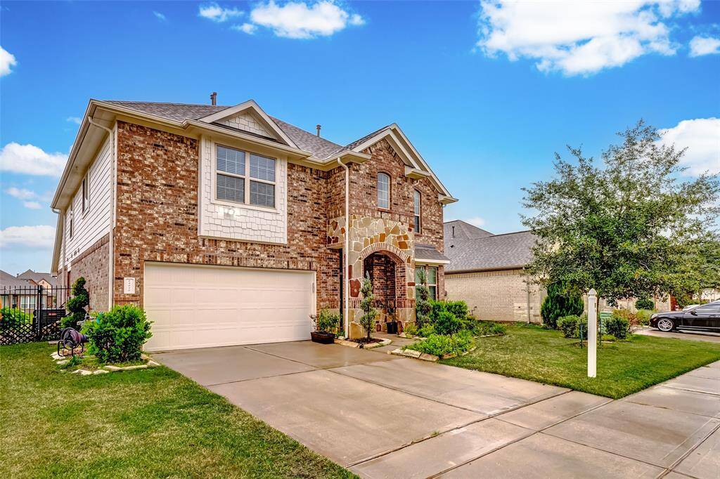 The home offers breathtaking views of lake and is nestled within a highly desirable community.
