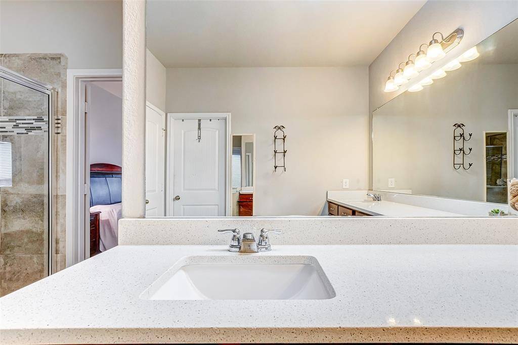 Each sink has its own vanity, providing ample counter space and storage for personal items.