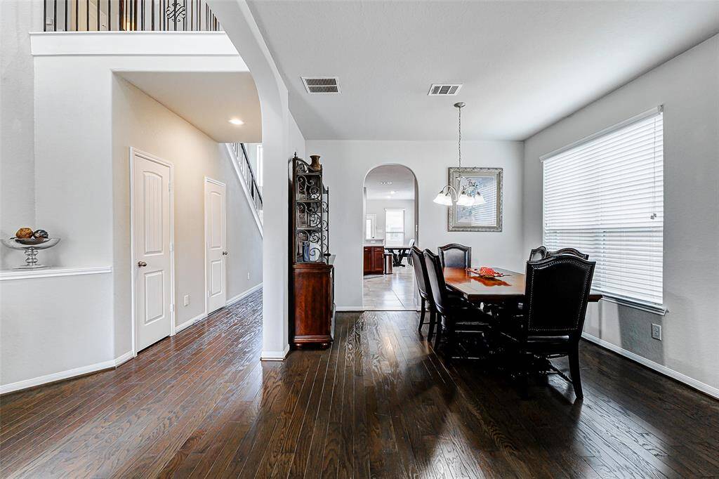The ideal dining space would be spacious enough to allow for easy movement around the table and chairs, even when fully occupied.