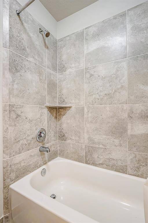 Shower with Tile and great tub.