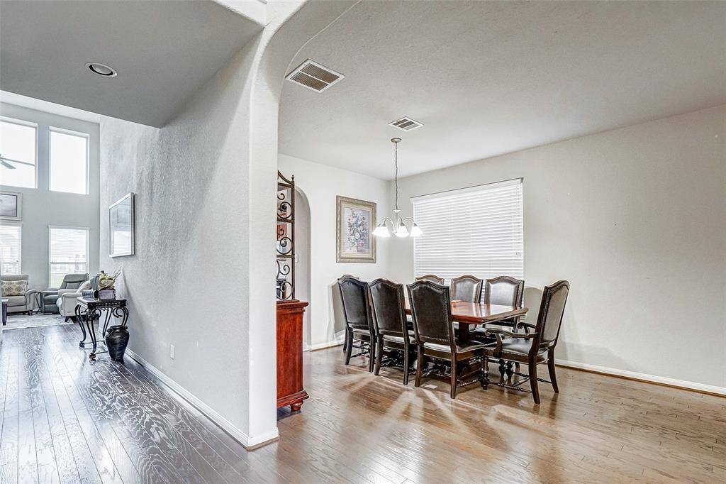 The dinning area has ample lighting, with natural light from windows or with a combination of overhead and accent lighting to create a warm and inviting atmosphere.