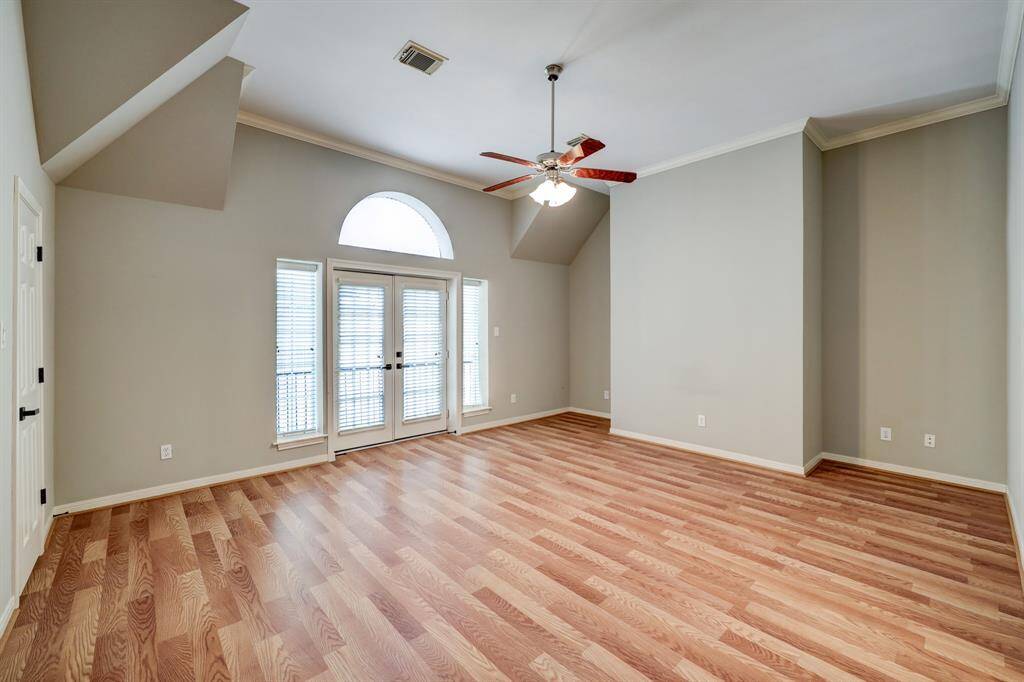 [Primary bedroom] Located on third level. This large tranquil bedroom is a sanctuary where you can escape the outside world and find solace in its serene embrace. Private balcony and two walk in closets