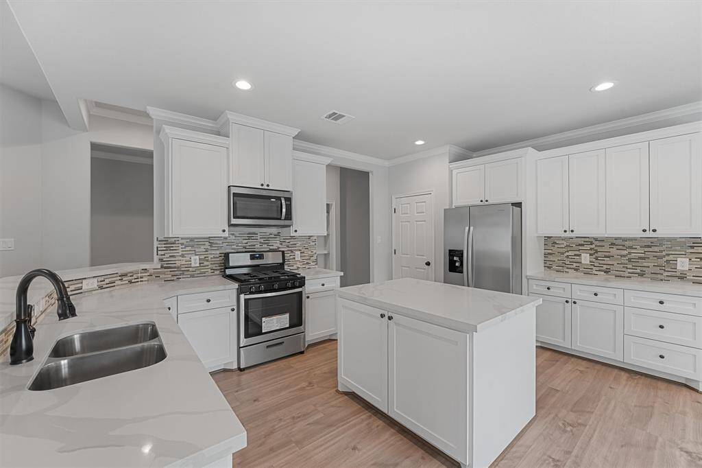 *Photo of previous home built by builder