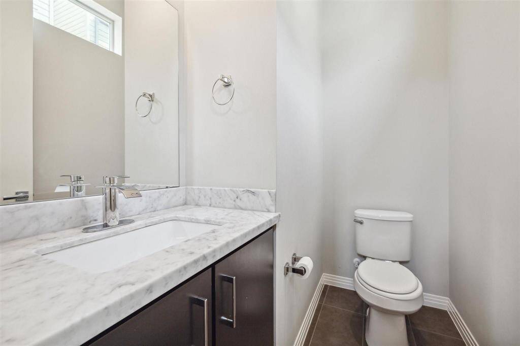 Half Bath on second Level by stairs.