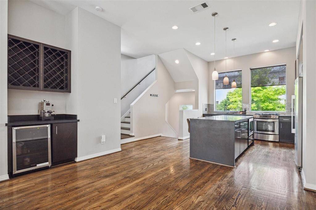 Dining room area across from wine center.  Microwave is built into the island.