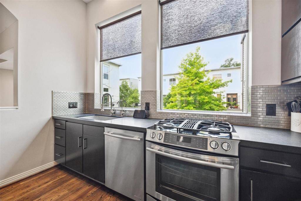 Stainless appliances and private with no back yard neighbor and lots of light.  Freestanding gas stove.