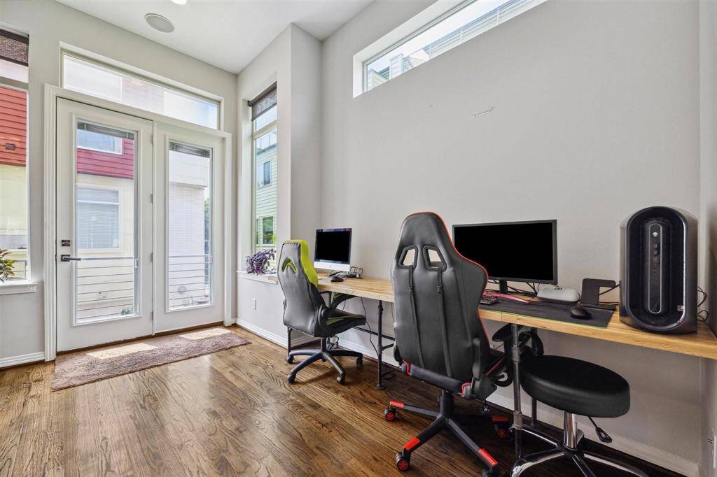 Seller used this side area for his office area, but you could add a row of cabinets with granite top for more serving area or bookcases to fit your need.