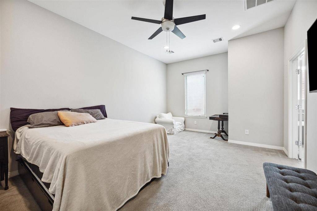 Primary bedroom with alcove area.