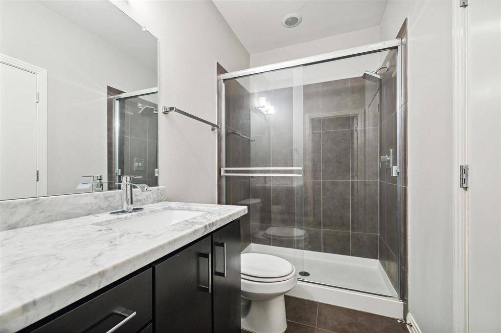 Secondary ensuite bath on 1st floor with walk-in shower