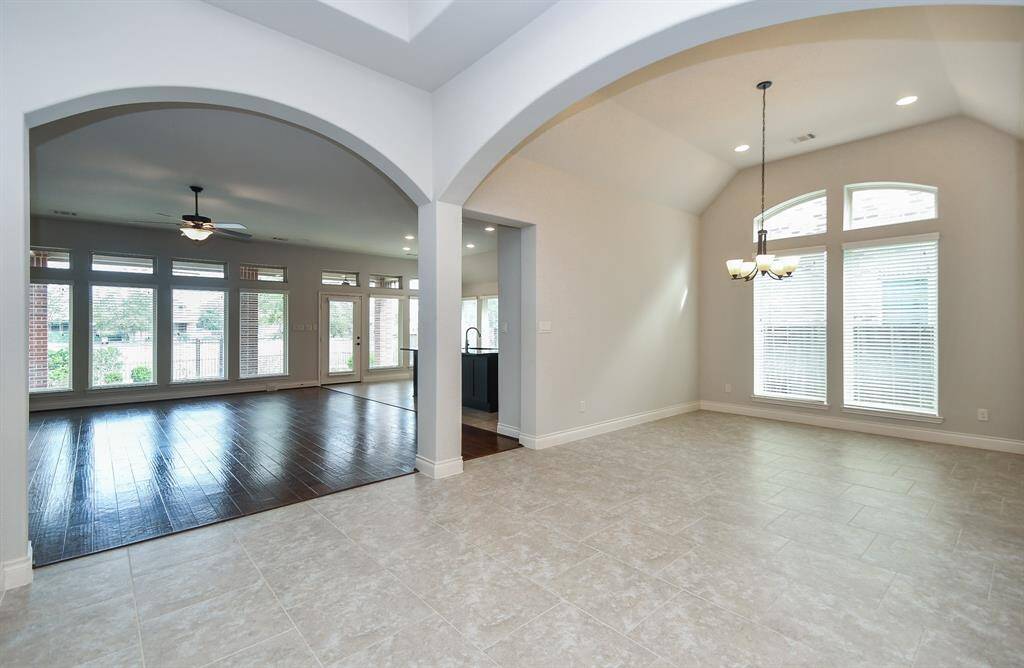 The dining room is located next to the kitchen/family room area--for ease in entertaining your guests.
