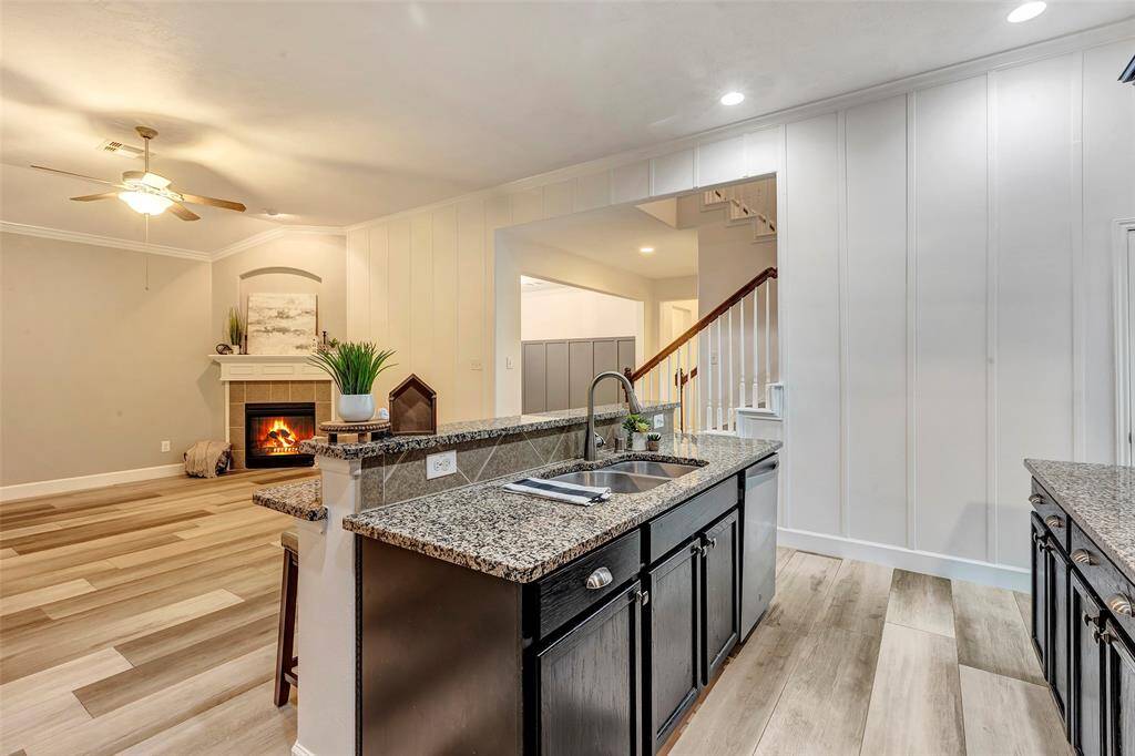 Enjoy the convenience of an open design as the kitchen flows effortlessly into the family room making "family time" easy.