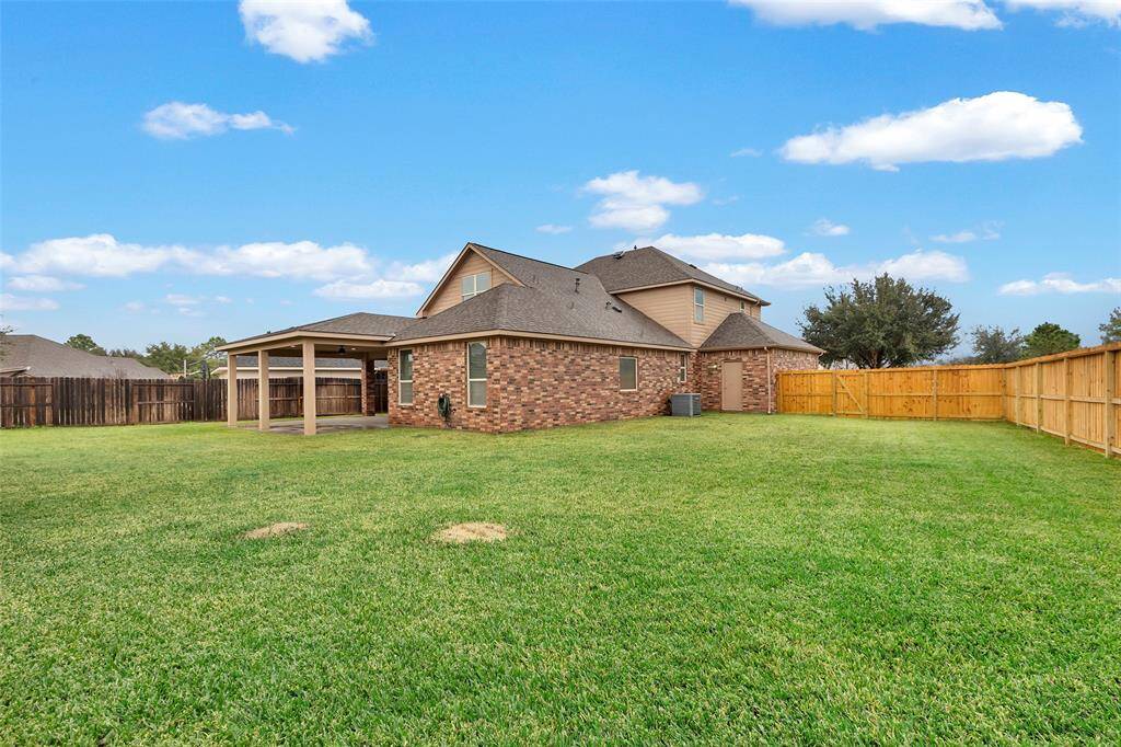 With an almost 11,000-square foot lot, there’s plenty of room to add a pool while still leaving space for a soccer field or a playground in this large backyard.