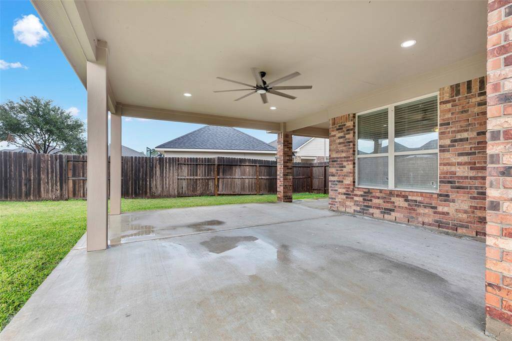 Stay cool in summer with the patio’s 50-inch ceiling fan, a thoughtful upgrade for Texas heat.