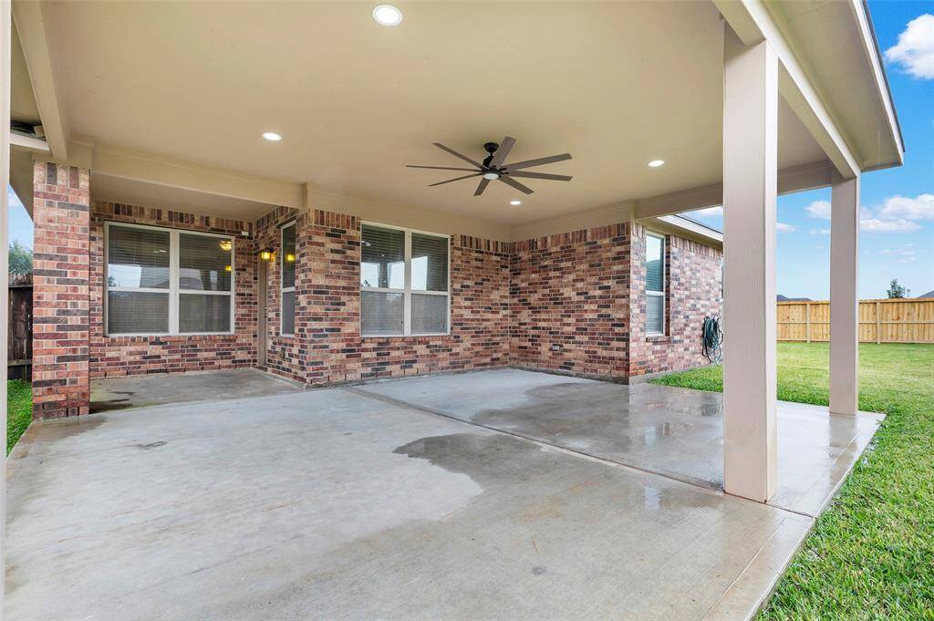 The expansive patio accommodates outdoor dining, casual seating, and even a grill, with plenty of room to spare. And the LED lights with a dimmer switch let you control the ambience.