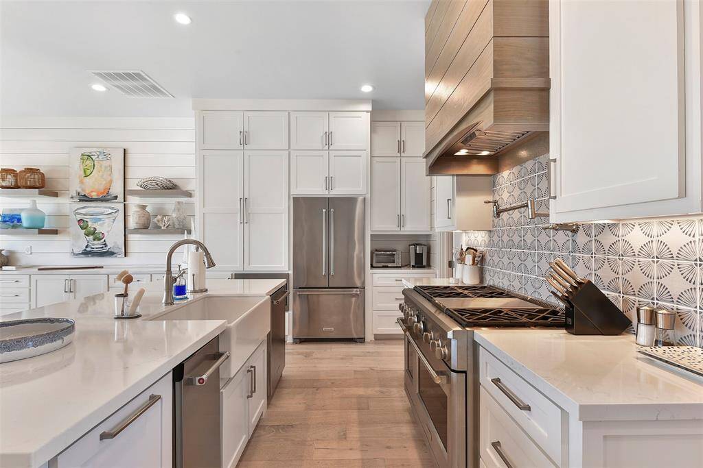 Notice the extra pantry space (large cabinet) to the left of the refrigerator