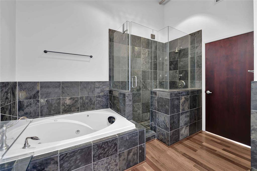 Primary Bathroom with jetted tub and oversized shower.
