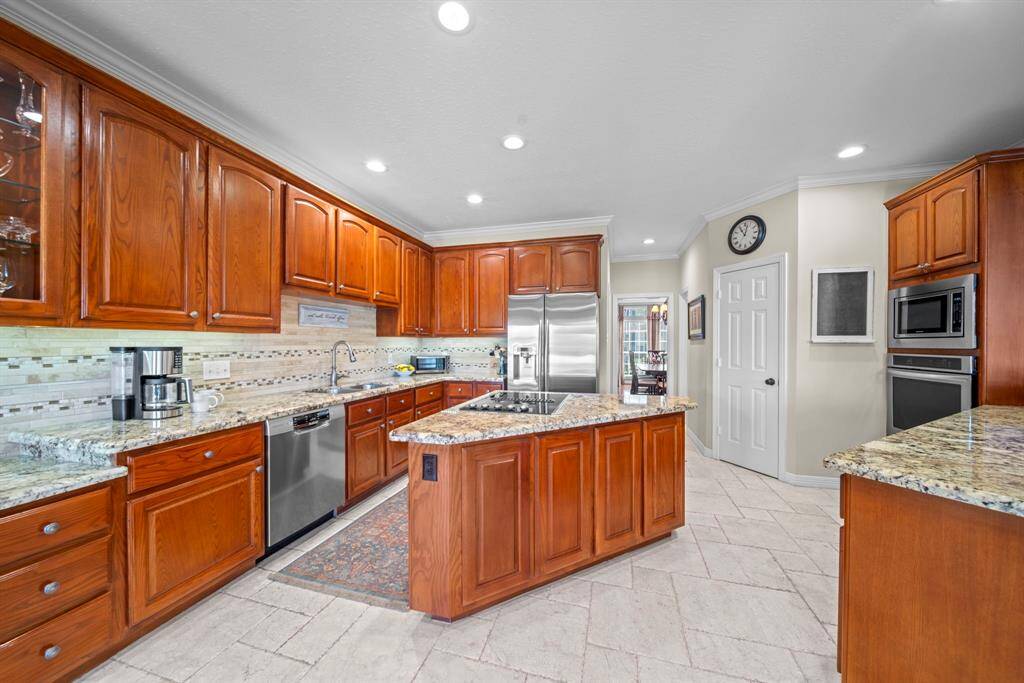 Refinished cabinetry featuring soft-close functionality and elegant under-cabinet lighting.