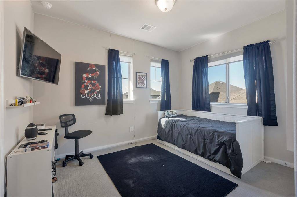Another secondary bedroom that meets up with the full bath.