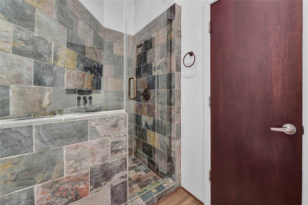 Walk in shower in second bedroom with en suite bath.