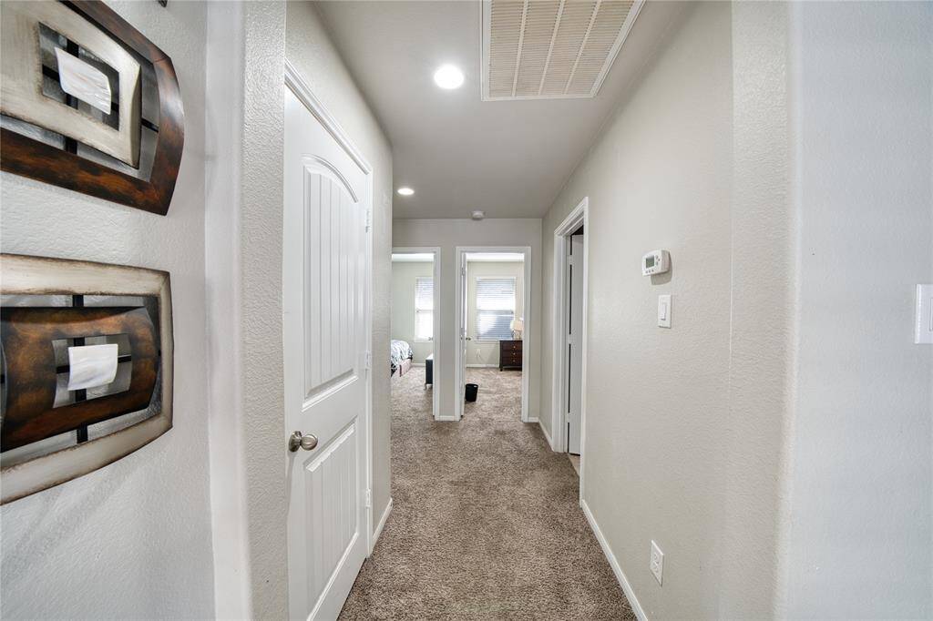 Hallway that leads to the secondary bedrooms.
