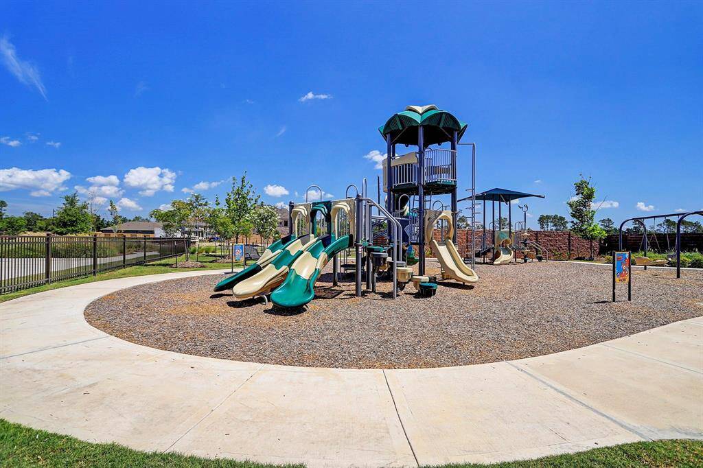 Great playground for the little ones that has a fence around it for security.