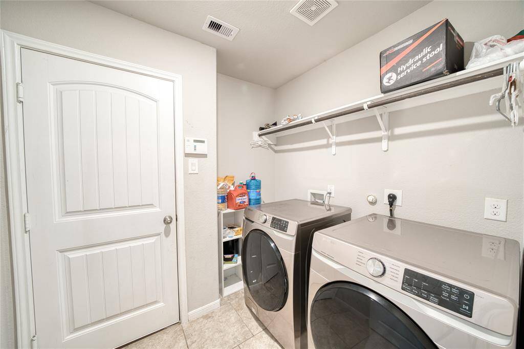 Walk in laundry room. Washer dryer Included.