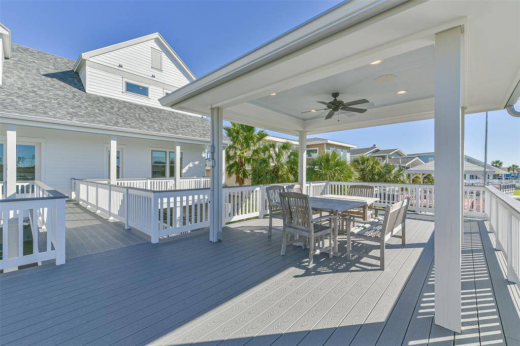 Covered seating area on boathouse deck