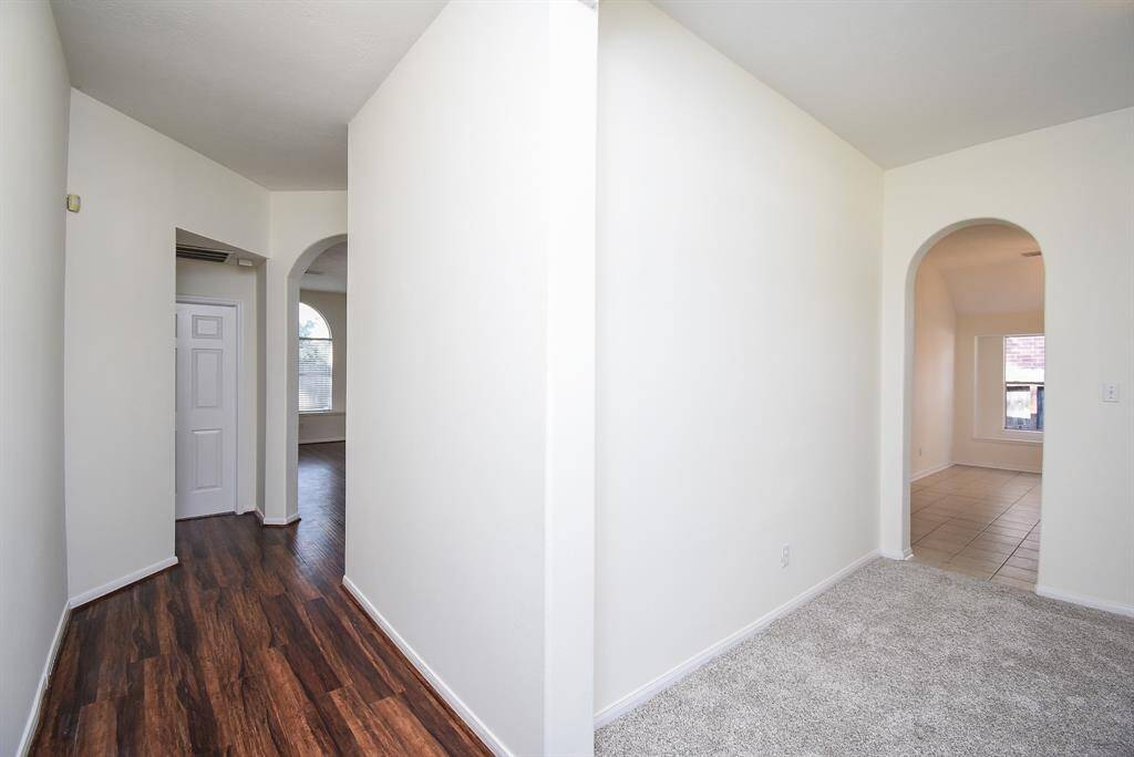 This stunningly designed hallway delivers both functionality and undeniable charm. It is more than just a passage; it confidently welcomes you into your new home.