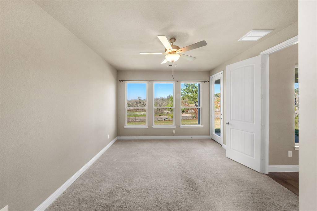 Another angle of the amazing primary suite with access to the back yard!