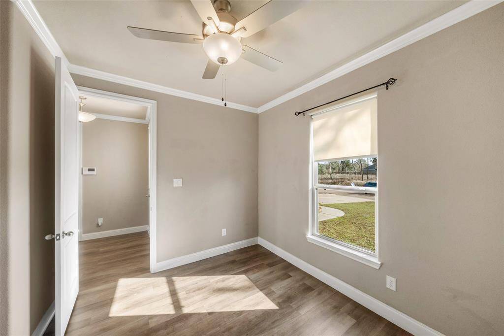 The third bedroom, with more beautiful wood flooring!