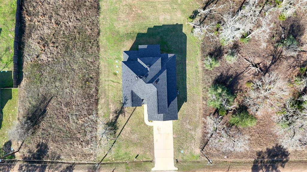 Situated on just inder 1/3 of an acre, this house is ready to be made a home!