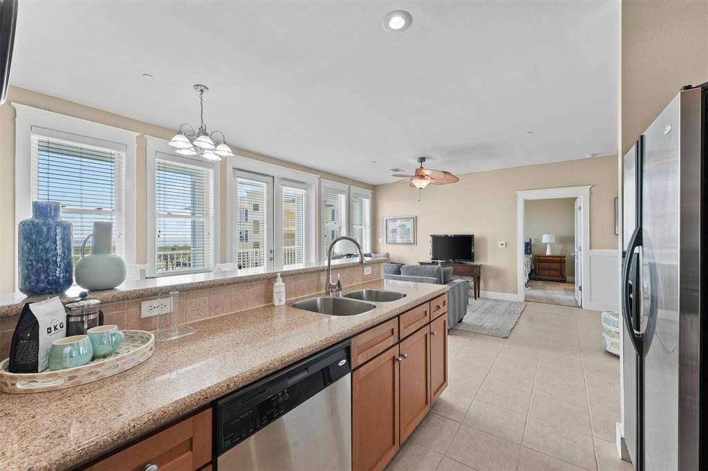 With easy access to the main living space, the kitchen allows for seamless interaction with family and guests. The open design ensures the chef is never isolated from the conversation.