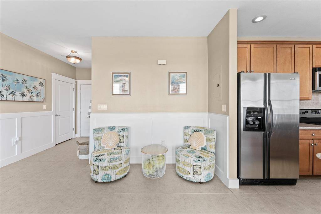 The practical layout includes a cozy nook that offers a quiet retreat within the living space.