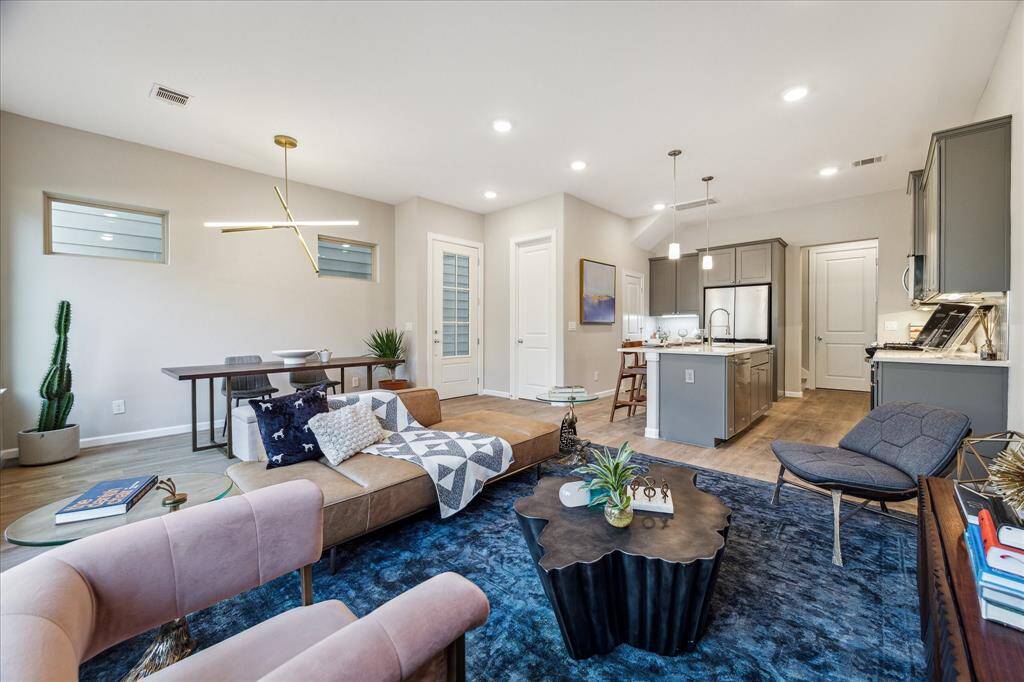 Gorgeous living and dining area with abundant natural light.