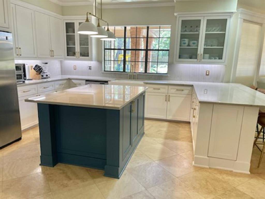 Expansive kitchen with ample countertop space for all your culinary needs.