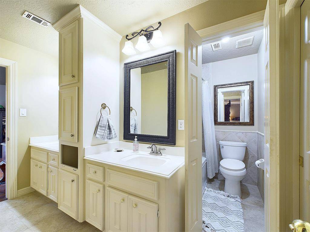 Convenient Jack & Jill bathroom connecting bedrooms 3 and 4.