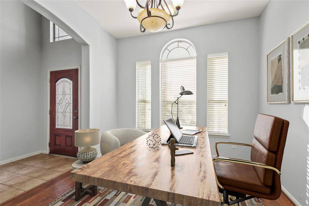 office or formal dining room, staged with furniture photo