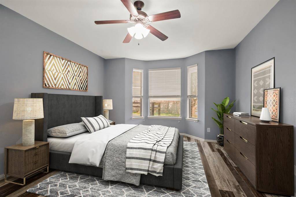 primary bedroom, staged with furniture photo