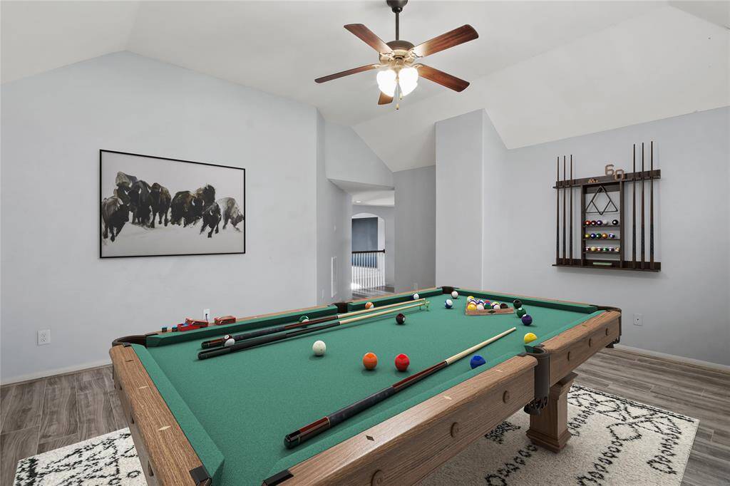 upstairs game room, staged with furniture photo