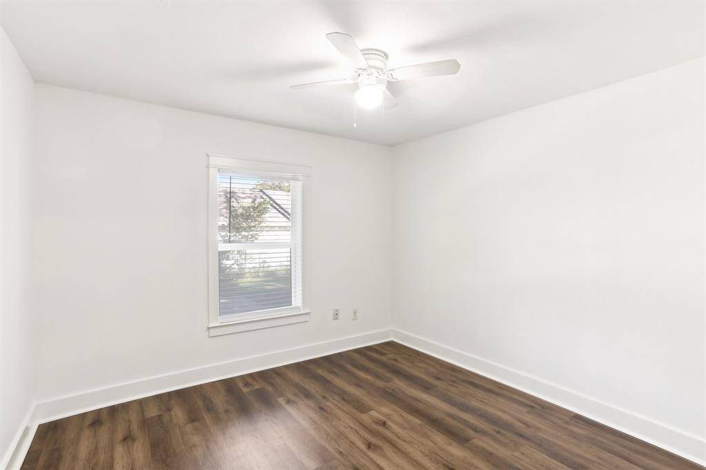 Another view of primary bedroom.