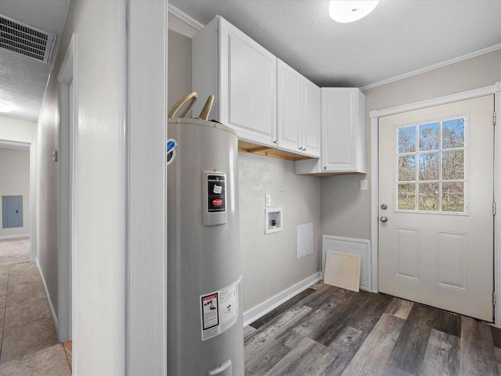 Utility Room, leads to backyard.
