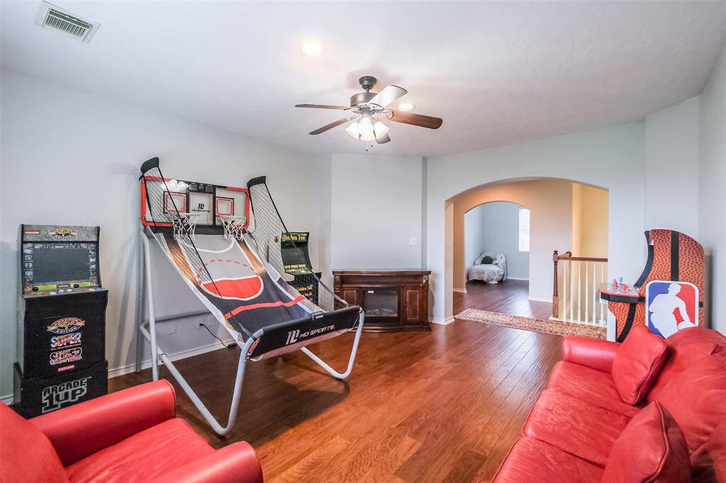 Upstairs game room open to small cat walk