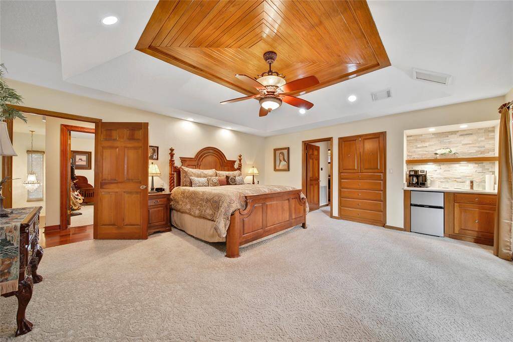 You don't have to leave your bedroom before 10 am with this built in coffee bar and mini fridge! Built in dresser and direct access to the bonus room and upstairs laundry.