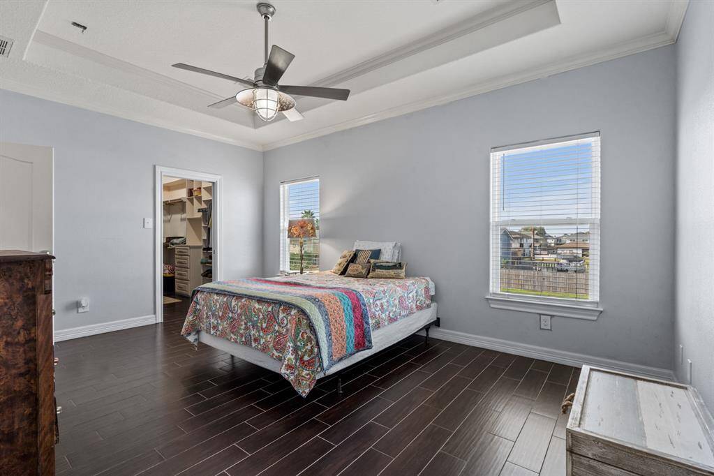 Grat size master, with large walk in closet with built ins and pocket door.