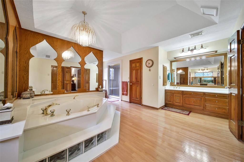 Her vanity area is just a little larger! Walk in shower is to the left of that vanity.
