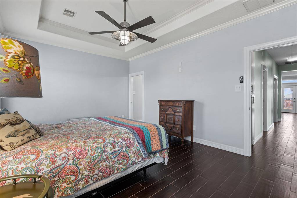 Tray ceilings an natural light in the primary bedrooom.