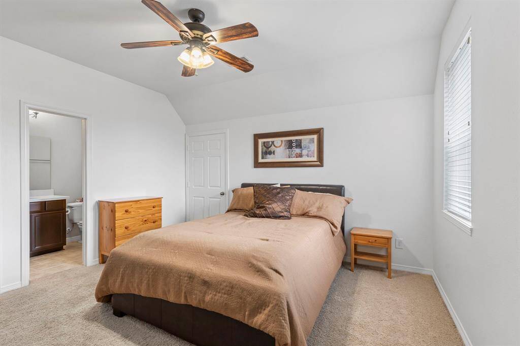 Bedroom 4 with private bathroom located at the end of the hall.